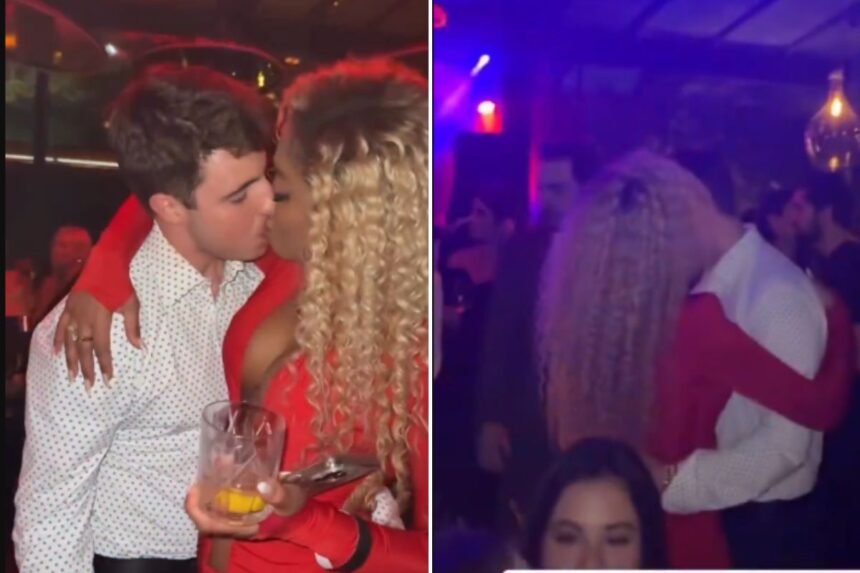 Cariúcha e filho de Gugu Liberato surpreendem com beijo em festa
